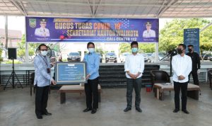 Penyerahan Bantuan Program Sosial Bank Indonesia (PSBI) di Posko Gugus Tugas Covid-19